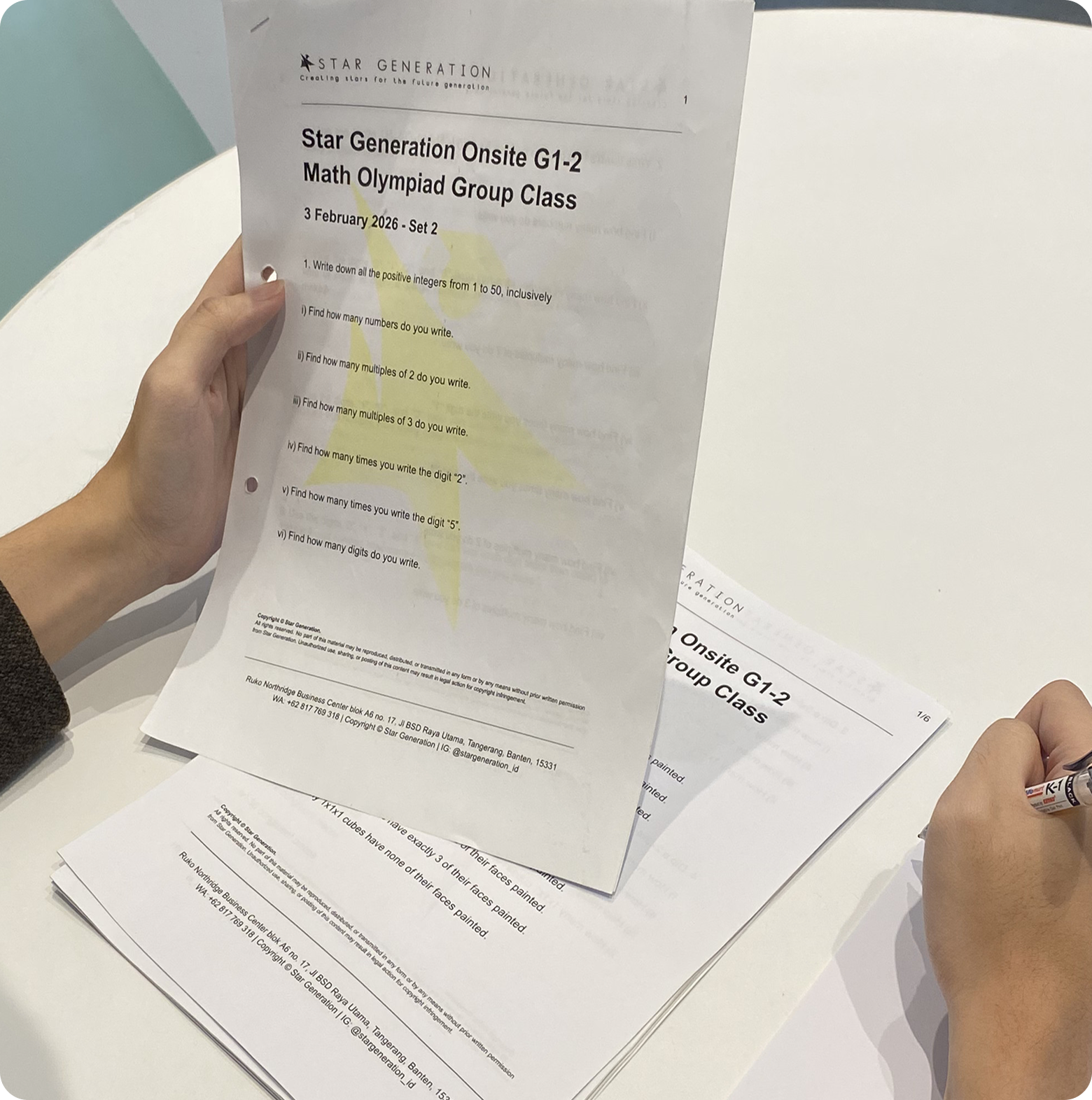 Tutor reviewing teaching materials